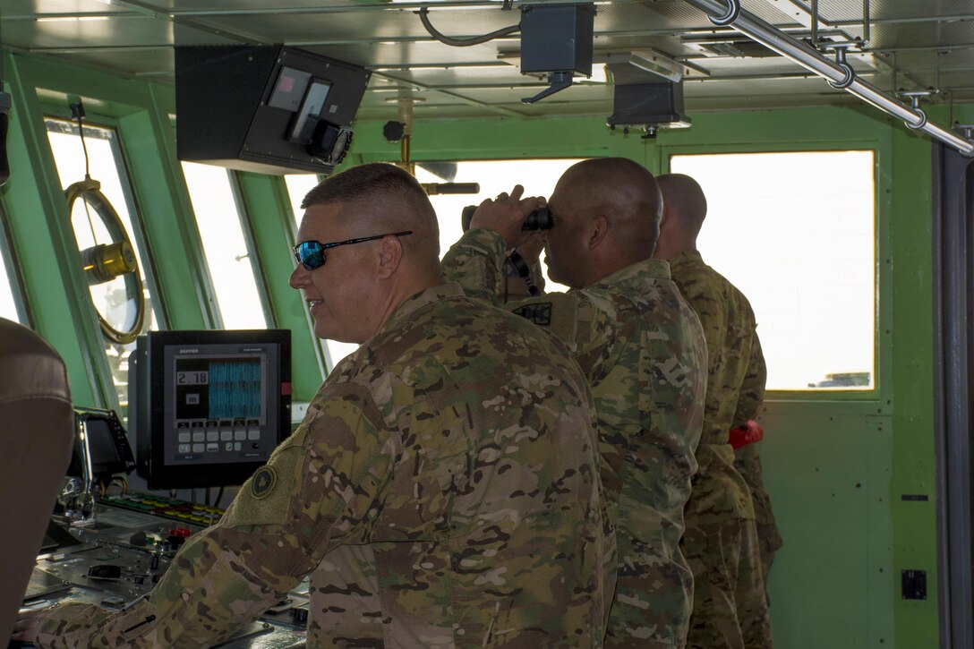 Kuwait-The Soldiers of the LCU2013 Churubusco- a Landing Craft Utility vessel from Detachment 1, 481st Transportation Company, California, perform a grid pattern search for the personnel of 77th Combat Aviation Brigade, Arkansas, and Bravo company, 1-111th Aviation Regiment, Florida, during a personnel recovery mission replicating a downed aircraft scenario, Feb. 13. 
(Photo by Army Sgt. 1st Class Suzanne Ringle/Released)