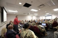 James Haycraft, First Army G3 (Operations), discusses pre-mobilization expectations and highlights the importance of identifying needs and vacancies to mobilizing battalions during opening remarks at an operational mobilization training and assessment brief hosted by the 85th Support Command, Mar. 3, 2017. The briefing was to prepare the 85th Support Command’s U.S. Army Reserve logistics support and training support battalions, operationally controlled by First Army, that have been identified for upcoming mobilizations in support of First Army’s post mobilization training requirements at Mobilization Force Generation Installations. Throughout the three-day assessment brief, the command staffs prepare the units in terms of readiness, training, equipment and personnel. The briefing highlights the Army Reserve’s contribution within the multi-component partnership shared with First Army. Army Reserve Soldiers have different mechanisms, and funding allocations to name a few contrasts from their active component partners, but Col. Robert Cooley, Deputy Commander, 85th Support Command, explained that the end state is the same – to get trained Soldiers ready to do their mission whether it is CONUS (Continental United States) or OCONUS (Outside Continental United States). The goal for the three-day event is to establish a unified, synchronized deployment readiness plan for the execution of pre-deployment training.
(U.S. Army photo by Master Sgt. Anthony L. Taylor/Released)