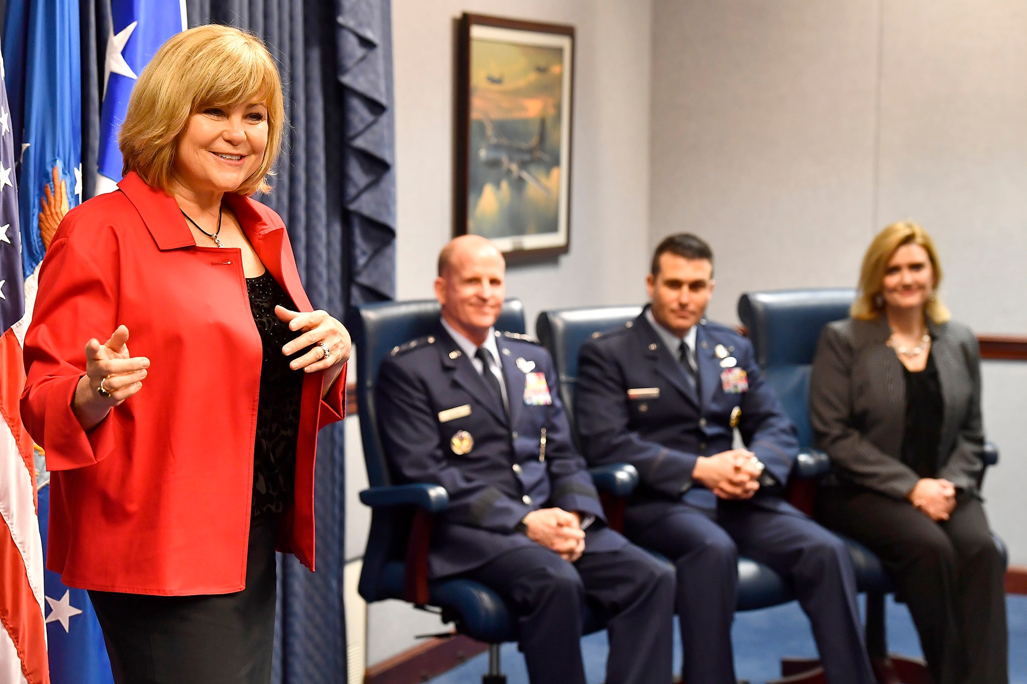 Sharon O'Malley-Burg, daughter of Gen. Jerome O'Malley, helps Gen. Stephen Wilson, the Air Force Vice Chief of Staff, present the 2016 O'Malley Award to Col. John Wagner and his wife, Jennifer, during a Pentagon ceremony, March 7, 2017. The Wagners earned the award for their work at Buckley Air Force Base. Colo. (U.S. Air Force photo/Scott M. Ash)