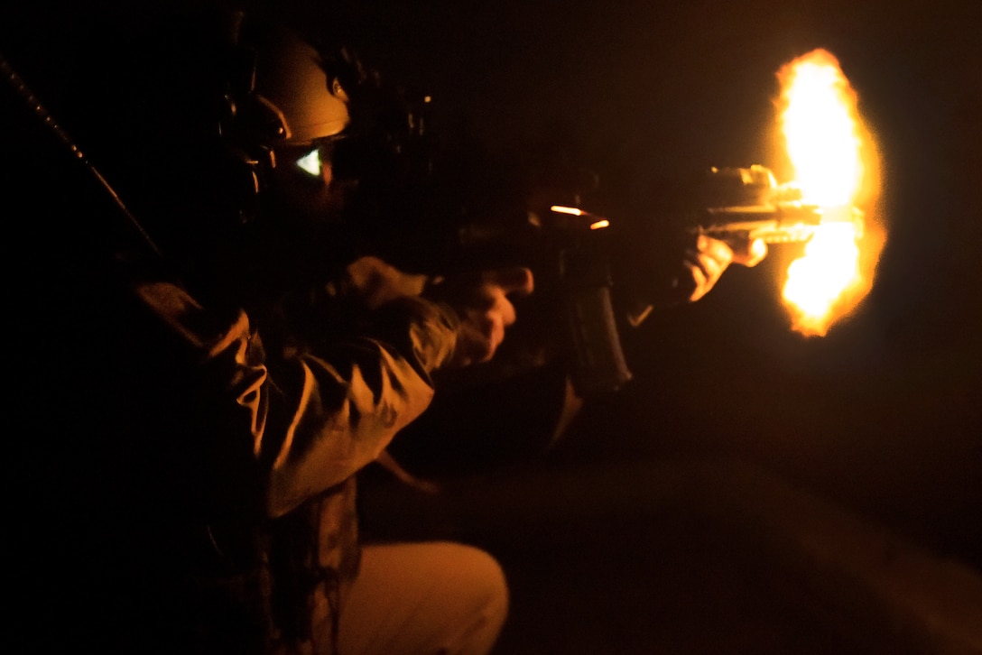 An airman returns fire on a simulated enemy position during Emerald Warrior 17 at Eglin Air Force Base, Fla., March 2, 2017. Air Force photo by Tech. Sgt. Barry Loo