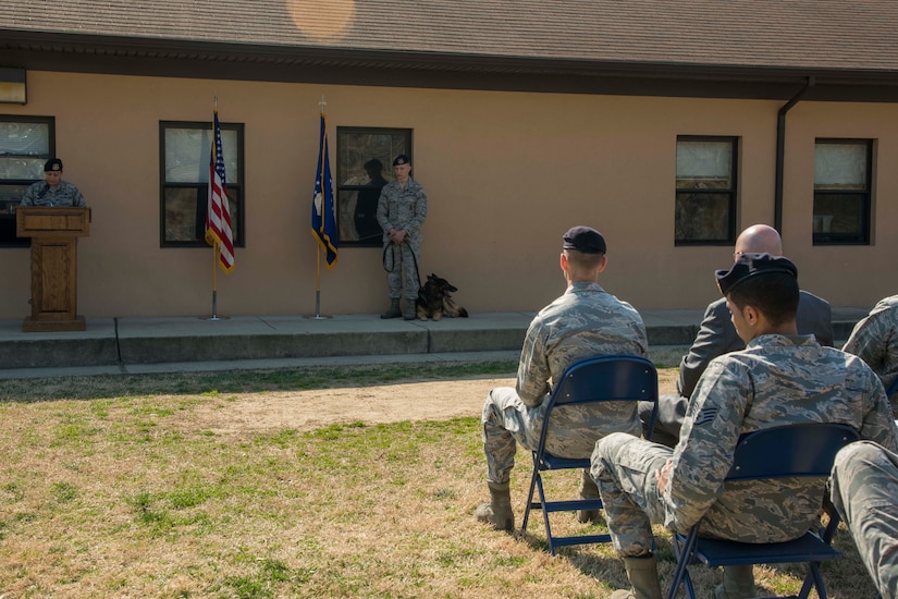 Base members attend Teo’s, 11th Security Support Squadron military working dog, retirement ceremony at Joint Base Andrews, Md., March 9, 2017. The 11 year-old German Shepard served 10 years as an Air Force explosive detection dog. (U.S. Air Force photo by Airman 1st Class Valentina Lopez)