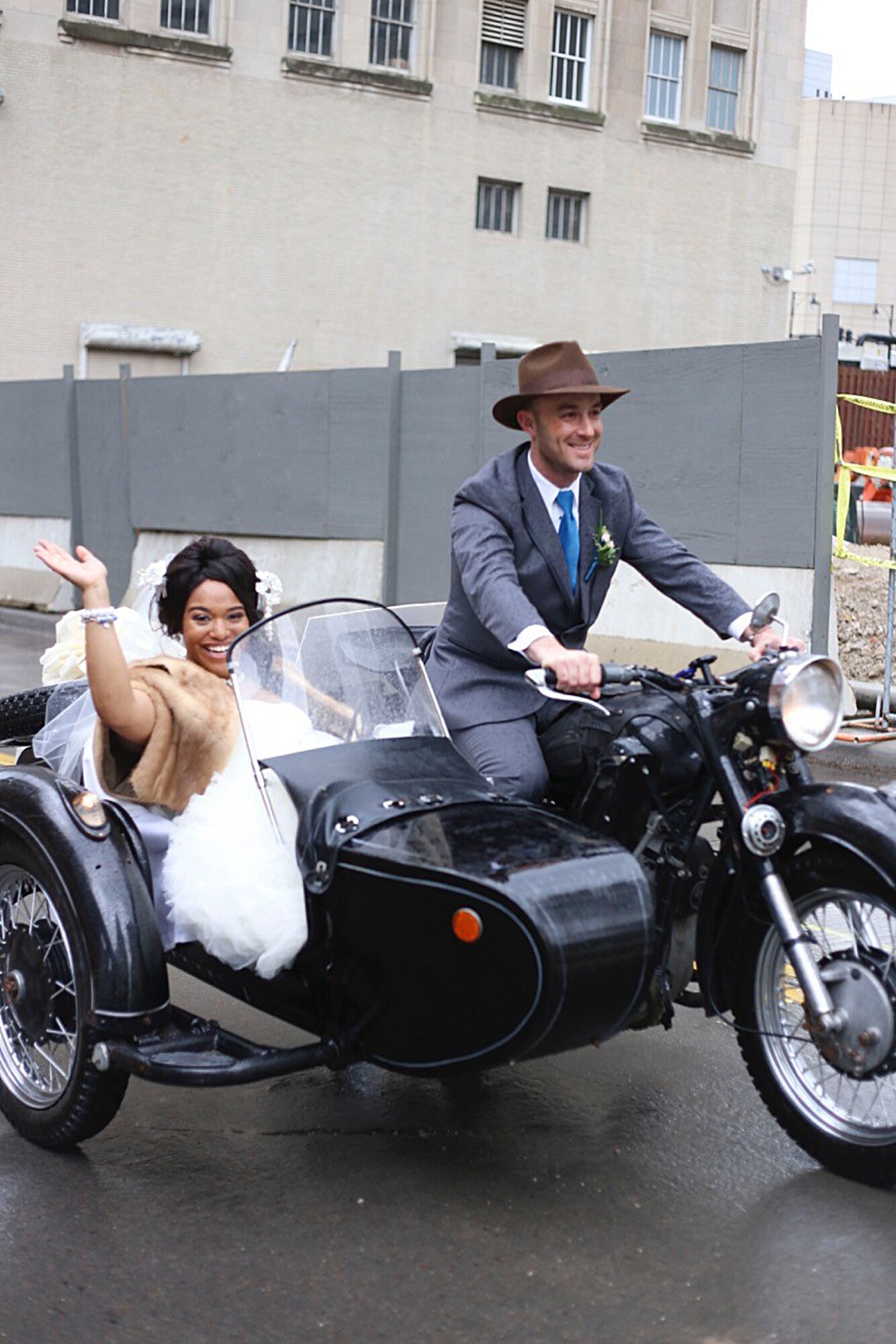U.S. Air Force Capt. Renee Cassidy, the 509th Maintenance Operations officer in charge, and Capt. Justin Cassidy, the 13th Aircraft Maintenance Unit officer in charge, depart on their motorcycle following a vow renewal ceremony in Kansas City, Mo., May 2015. (Courtesy photo)