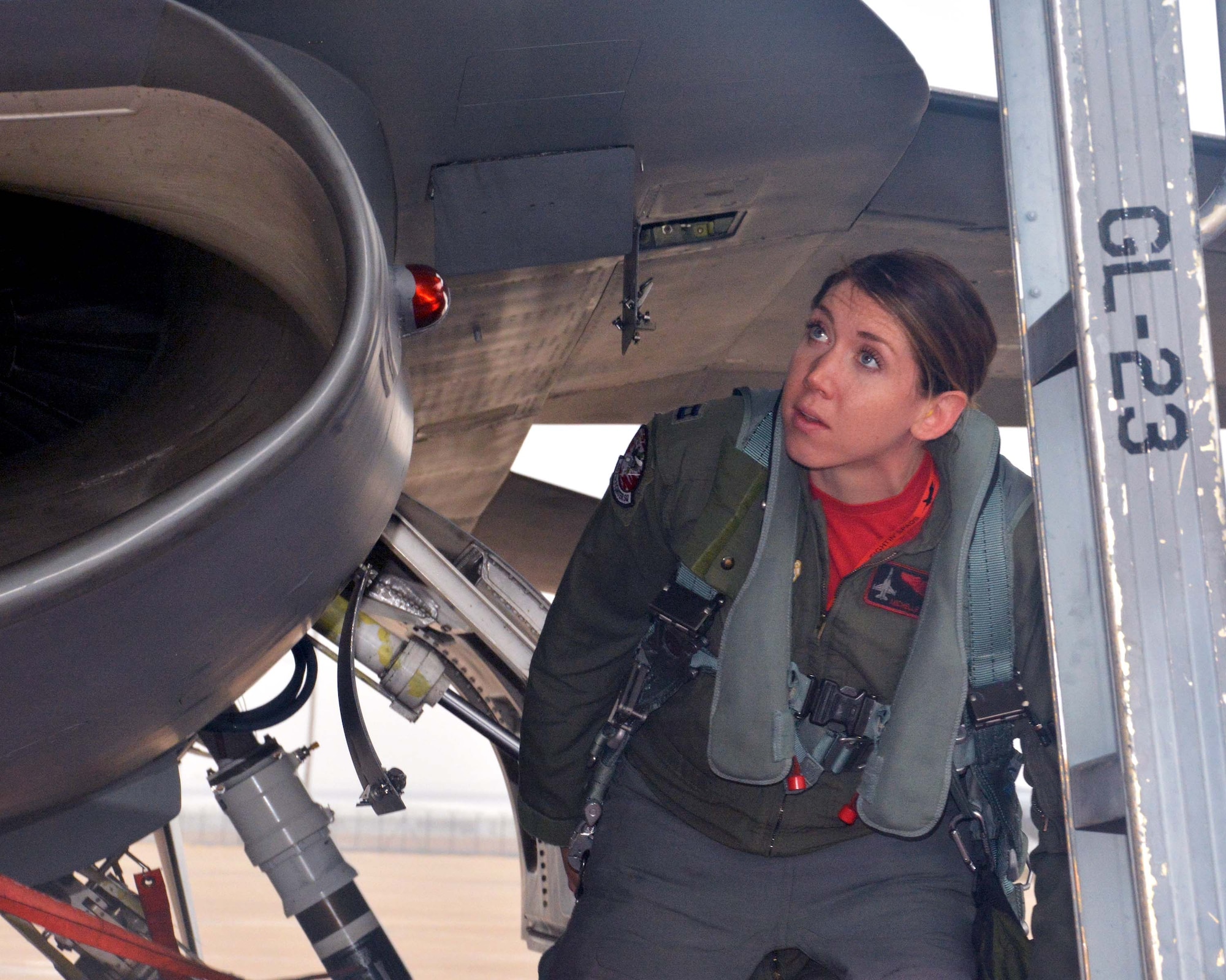 Capt. Michelle “Mace” Curran, 355th Fighter Squadron F-16 pilot, inspects her aircraft on the flightline during launch preparations Mar. 4, 2017. Curran recently became an instructor pilot and said it’s a big turning point in her career because she’s responsible for teaching new pilots essential skills and knowledge for success. (U.S. Air Force photo by Staff Sgt. Samantha Mathison)