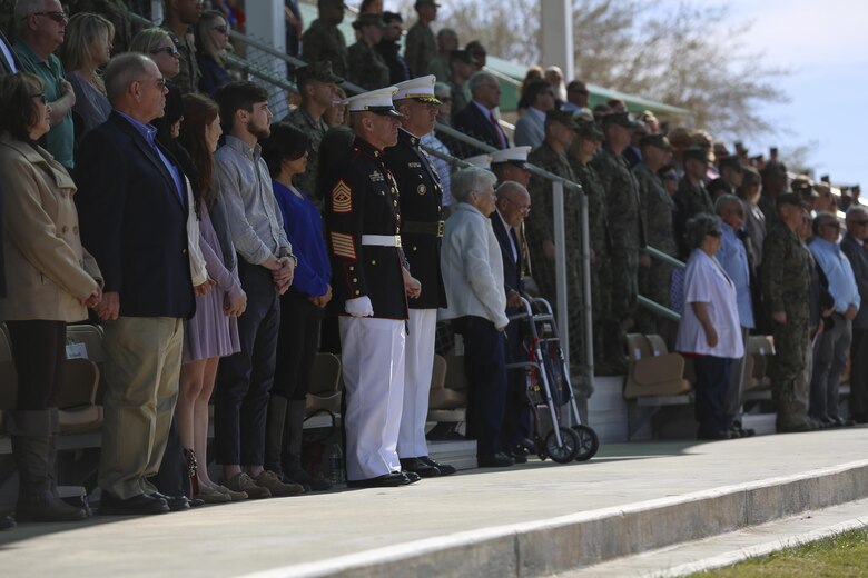 Brig. Gen. William F. Mullen III, Combat Center Commanding General, and Sgt. Maj. Michael J. Hendges, Combat Center Sergeant Major, stand as the U.S. Marine Corps Drum & Bugle Corps plays the “Marines’ Hymn” during the Battle Color Ceremony at Lance Cpl. Torrey L. Gray Field aboard Marine Corps Air Ground Combat Center, Twentynine Palms, Calif., March 8, 2017. The U.S. Marine Corps Battle Color Detachment travels worldwide annually to demonstrate the discipline and “Esprit de Corps” of Marines. (U.S. Marine Corps photo by Lance Cpl. Natalia Cuevas)