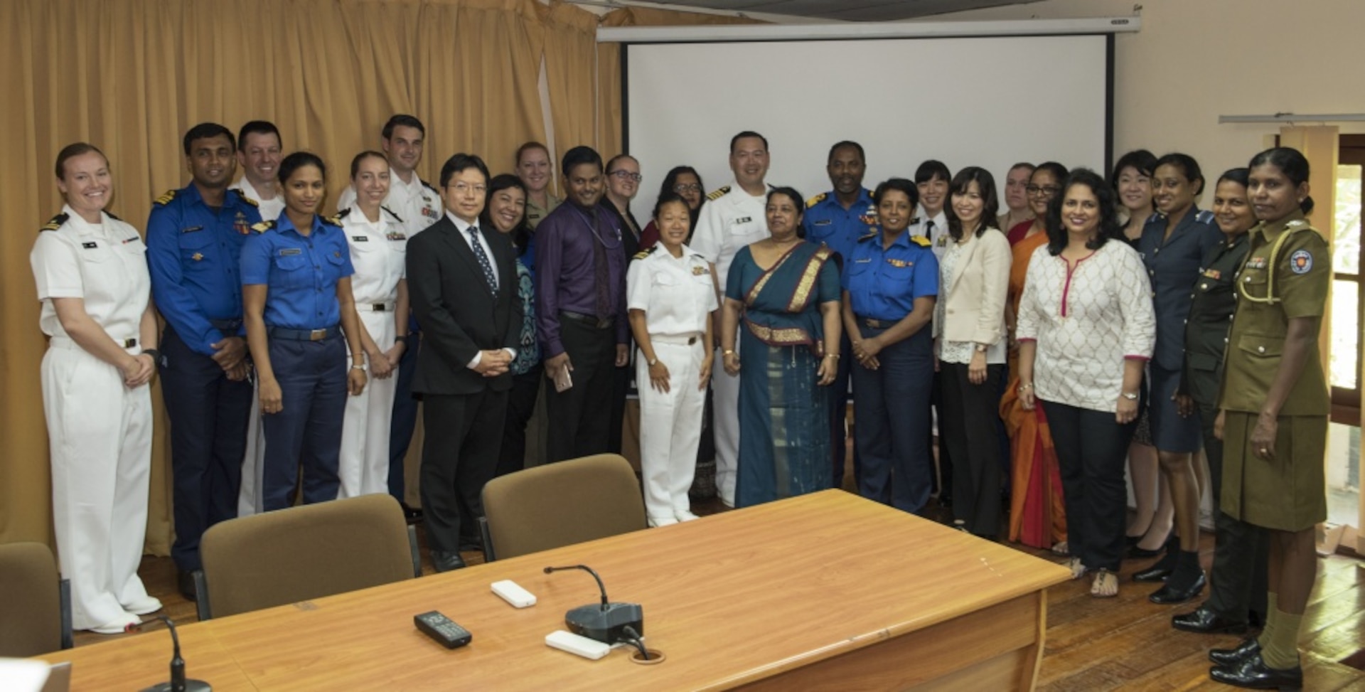 Participants of the Pacific Partnership 2017 Women, Peace and Security symposium gather for a group photo during Pacific Partnership 2017 Sri Lanka March 9. Pacific Partnership is the largest annual multilateral humanitarian assistance and disaster relief preparedness mission conducted in the Indo-Asia-Pacific and aims to enhance regional coordination in areas such as medical readiness and preparedness for manmade and natural disasters. 