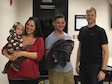 Abby Meskimen, mother of the newborn, Airman 1st Class Deangelo Wallman-Sims, 14th Civil Engineer Squadron Firefighter and Maj. Scott Meskimen, 14st Flying Training Squadron Instructor Pilot, hold the newborn baby boy, Khyrim Nikao and their daughter, Karamia, Feb. 10, 2017, at the Fire Station on Columbus Air Force Base, Mississippi. A team of seven Emergency Medical Responders responded to a call about a newborn baby that was not breathing. The EMRs provided care to both patients, resulting in the baby breathing on its own. (Courtesy photo) 