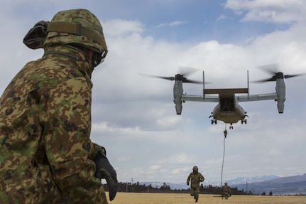 A Japanese Ground Self-Defense Force soldier observes as members of his team fast rope from a MV-22 osprey during exercise Forest Light at Soumagahara, Mar. 9, 2017.  Forest Light is one of various bilateral training opportunities conducted by Japanese Ground Self Defense and forward deployed U.S. Marine Corps forces to demonstrate the enduring commitment by both countries to peace, stability, and prosperity across the region. 