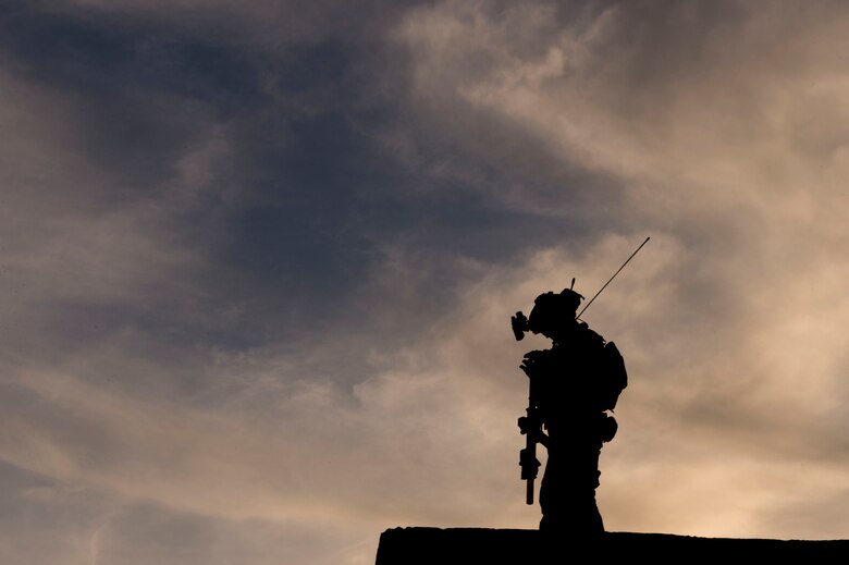 An Airman assigned to the 22nd Special Tactics Squadron calls in close air support during Emerald Warrior 17 at Eglin Range, Fla., March 4, 2017. Emerald Warrior is a U.S. Special Operations Command exercise during which joint special operations forces train to respond to various threats across the spectrum of conflict. (U.S. Air Force photo/Airman 1st Class Nicholas Dutton)