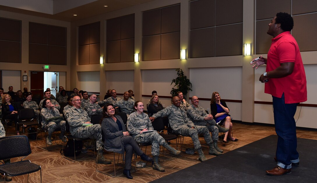 Darius Jones, youth and marriage speaker from the Center for Relationship Education, speaks March 9, 2017, during the Gender Differences Symposium at the Leadership Development Center on Buckley Air Force, Colo. The symposium was the kickoff event for the new mentoring programs on base. Man-to-Man is the group for men, while UpLift is for women. (U.S. Air Force photo by Airman 1st Class Gabrielle Spradling/Released)
