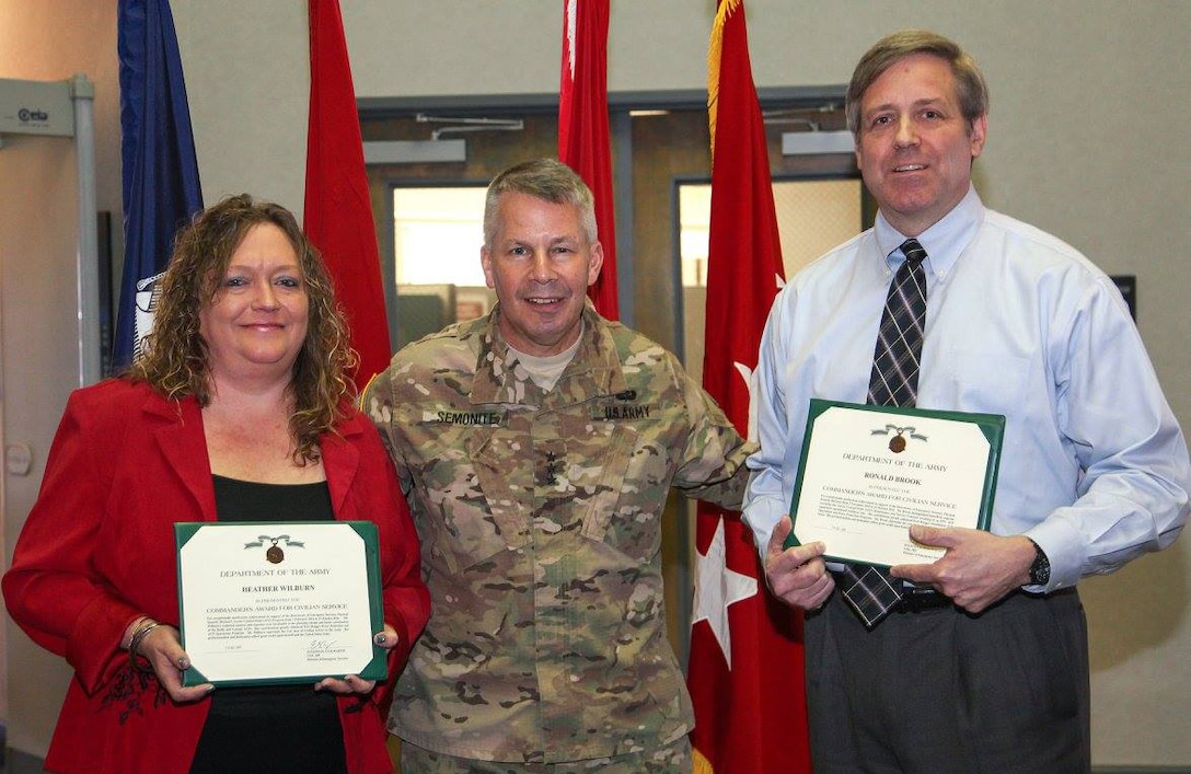 During his visit to Huntsville Center Feb. 16, U.S. Army Corps of Engineers Commander Lt. Gen. Todd Semonite presented Commander's Awards for Civilian Service to Access Control Point Program’s Heather Wilburn and Ron Brook on behalf of Col. Eugenia Guilmartin, Fort Bragg’s director of emergency services. The awards were for exceptionally meritorious achievement in support of access control point projects there.