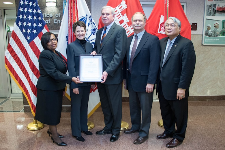 The U.S. Army Corps of Engineers was presented the Government-Wide Category Management Best in Class Solution award in a ceremony at the USACE headquarters in Washington, D.C., on Feb. 27.  From left to right: Jacqueline Woodson, USACE acting deputy director of Contracting; Mary Ruwwe, GSA Facilities and Construction Category; Lloyd Caldwell, USACE director of Military Programs; Charles Ford, Huntsville Engineering and Support Center programs director; and Stacey Hirata, USACE chief of Installation Support.