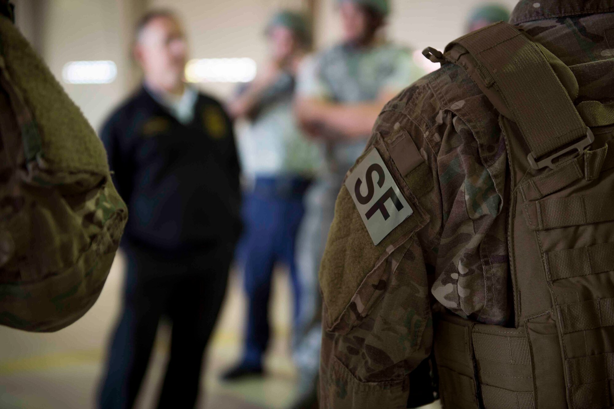 Air Commandos are briefed on new procedures for active shooter responses during an exercise at Hurlburt Field, Fla., March 10, 2017. Air Commandos with the 1st Special Operations Security Forces Squadron, 1st Special Operations Civil Engineer Squadron and the 1st Special Operations Medical Group participated in an exercise to practice new procedures for tactical responders. (U.S. Air Force photo by Senior Airman Krystal M. Garrett)