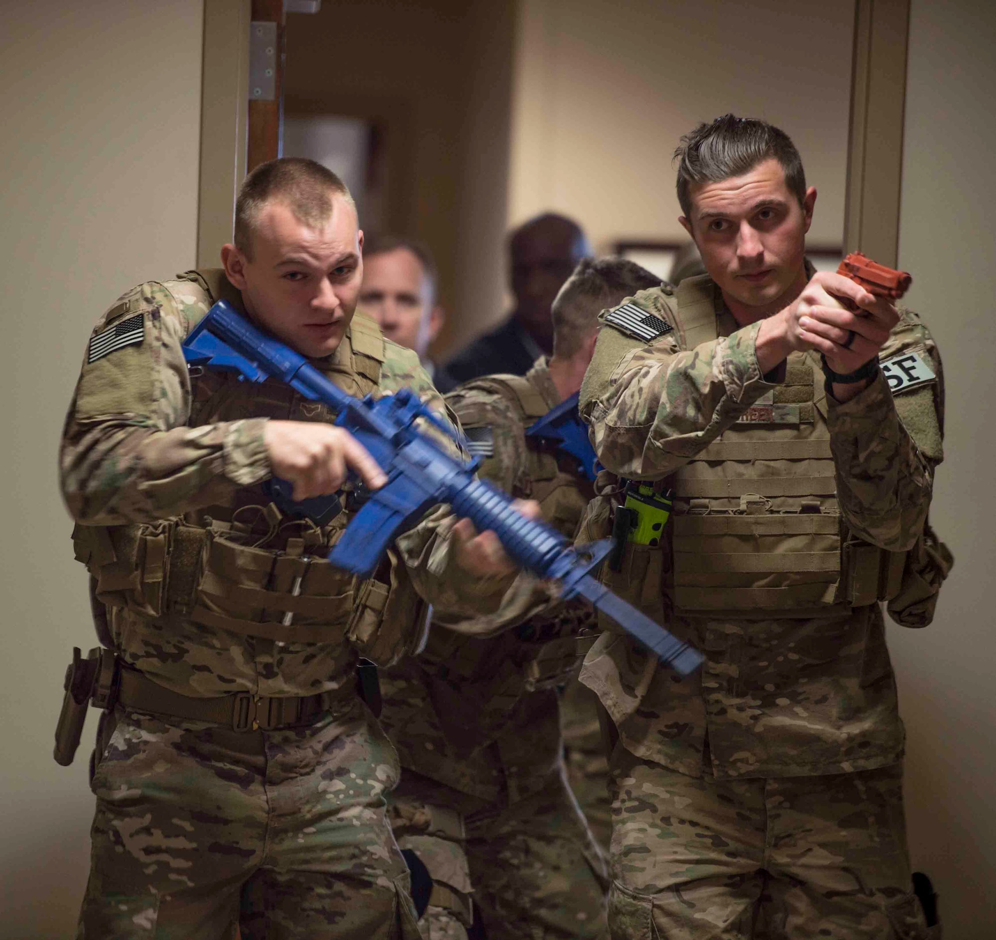 Air Commandos with the 1st Special Operations Security Forces Squadron, clear a building during an active shooter exercise at Hurlburt Field, Fla., March 10, 2017. The exercise was held to implement new procedures for tactical responders to increase chances of wounded victims’ survival. (U.S. Air Force photo by Senior Airman Krystal M. Garrett)