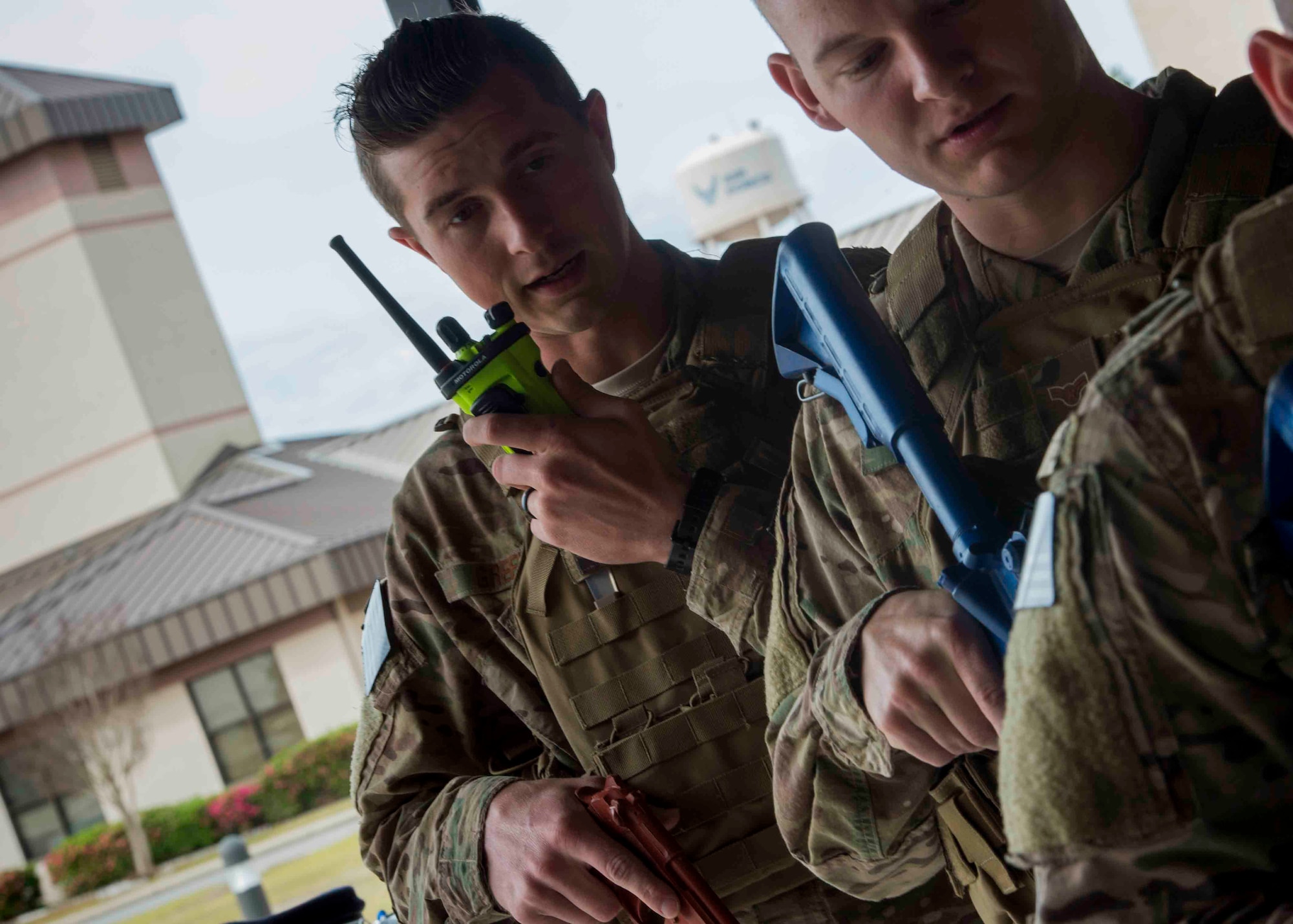 Staff Sgt. Zachary Green, a patrolman with the 1st Special Operations Security Forces Squadron, relays information via radio during an active shooter exercise at Hurlburt Field, Fla., March 10, 2017. The tactical respond team participated in three scenarios to remain proficient with new procedures. (U.S. Air Force photo by Senior Airman Krystal M. Garrett) 