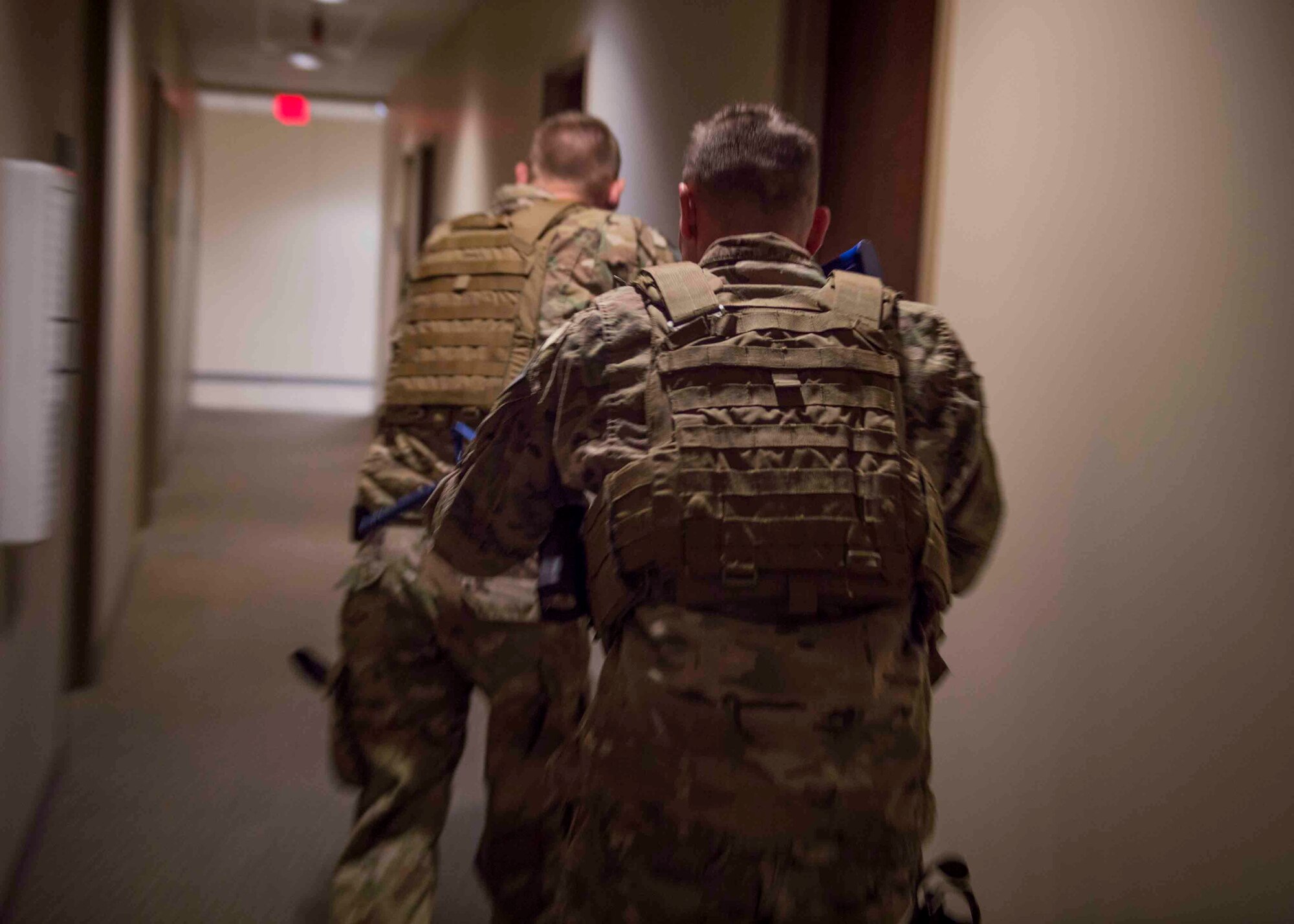 Air Commandos with the 1st Special Operations Security Forces Squadron clear a building during an active shooter exercise at Hurlburt Field, Fla., March 10, 2017. Security Forces members are first to enter the building when notified of an active shooter. The goal is to clear the building and neutralize the threat prior to rescuing victims. (U.S. Air Force photo by Senior Airman Krystal M. Garrett) 