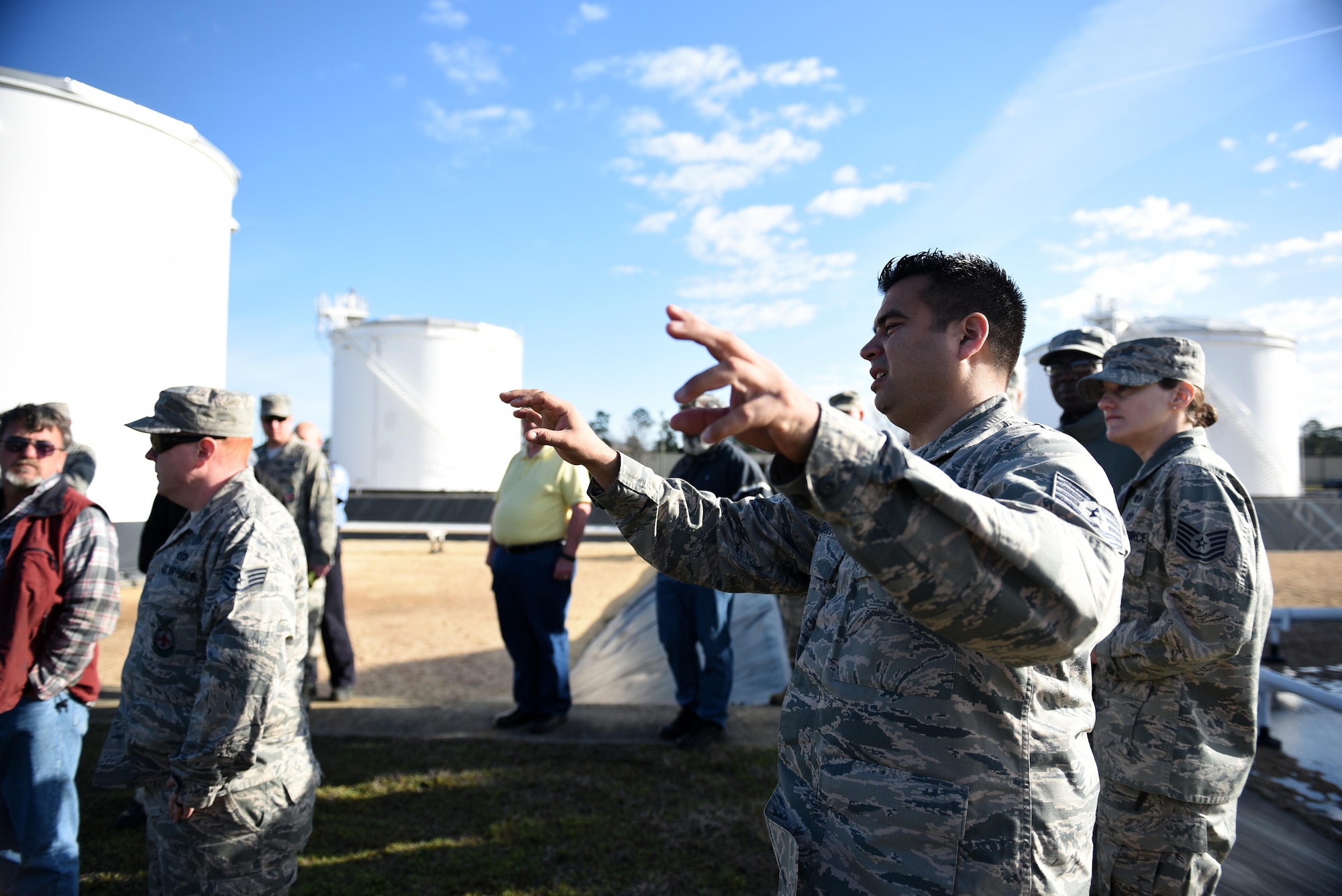 Tech. Sgt. Jose Ybarra, 4th Logistics Readiness Squadron fuels management flight safety and environmental officer, explains a simulated fuel spill scenario to Team Seymour members during an exercise March 2, 2017, at Seymour Johnson Air Force Base, North Carolina. Multiple squadrons and contractors from Seymour Johnson AFB attended the two-day exercise to create a plan of action in case of a fuel spill emergency. (U.S. Air Force photo by Airman 1st Class Kenneth Boyton)
