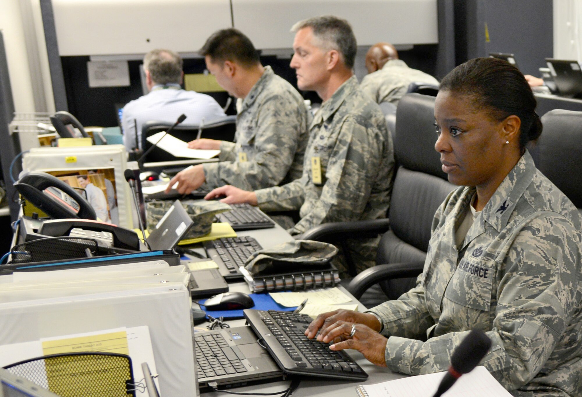 Col. Stephanie Wilson, 72nd ABW commander, leads Tinker’s Crisis Action Team, which is comprised of leadership from the air base wing and associate organization representatives. The CAT is the command and control site for the installation commander and supports the Emergency Operations Center. Strategic decisions are made regarding the mission and how the base is affected during any contingency. (Air Force photo by Kelly White)