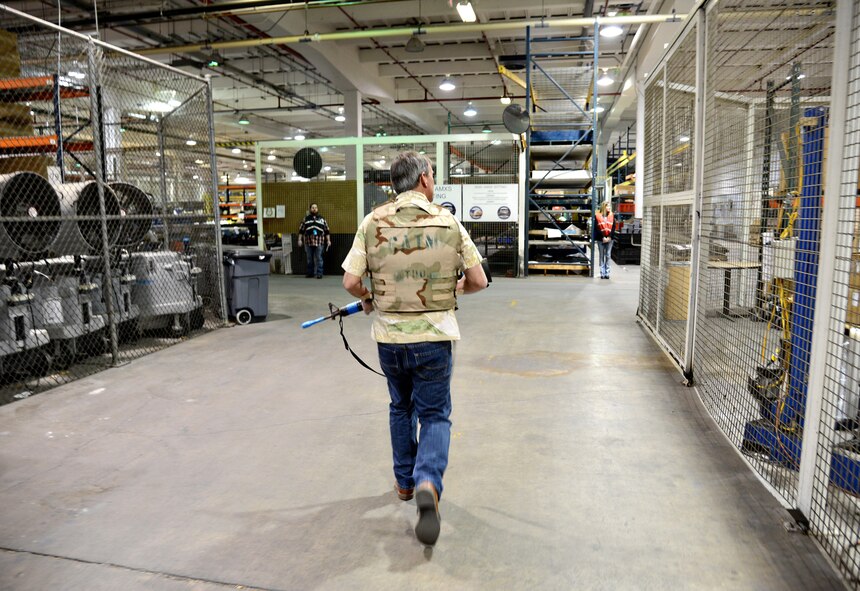 Paul Logan, with the Inspector General’s Office, played the role of an active shooter in an exercise held in Bldg. 3705 March 3. This exercise was the first active shooter exercise put on by the IG office specifically for the Oklahoma City Air Logistics Complex, as well as Defense Logistics Agency members who also work in the building. The purpose was to see how building occupants would react to an active shooter incident with first responders entering the building. (Air Force photo by Kelly White)