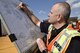 Clifton Nance, 72nd Civil Engineer incident operations chief, writes notes on a base map during the War Wagon 17-01 natural disaster preparedness exercise and tornado drill Feb. 27, 2017, Tinker Air Force Base, Oklahoma. Due to the frequent occurance of tornados and damaging weather in the region, Tinker AFB regularly holds exercises to ensure appropriate responses by the population and emergency crews. (U.S. Air Force photo/Greg L. Davis)