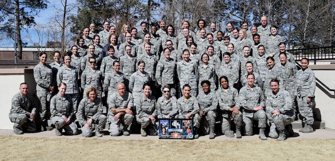 Air Force Space Command Women’s Leadership Symposium attendees pose for a group photo at Peterson Air Force Base, Colorado, Wednesday, March 8, 2017. Attendees came from a variety of bases, including Peterson, Schriever, Buckley, Vandenburg and Cheyenne Mountain Air Force Station. (U.S. Air Force photo/Senior Airman Arielle Vasquez)
