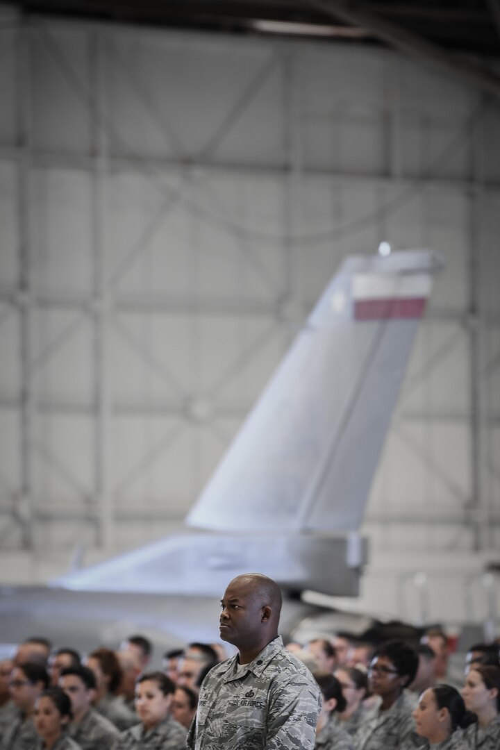 Lt. Col. Antwan Hopkins, wing chief of staff and comptroller flight commander, serves as the flight commander for a formation of the 149th Fighter Wing, Texas Air National Guard during a retirement ceremony honoring Command Chief Master Sgt. George Longoria at Joint Base San Antonio-Lackland, Texas, Feb. 25, 2017. Longoria retires after 35 years of military service. (U.S. Air National Guard photo by Tech. Sgt. Eric L. Wilson)