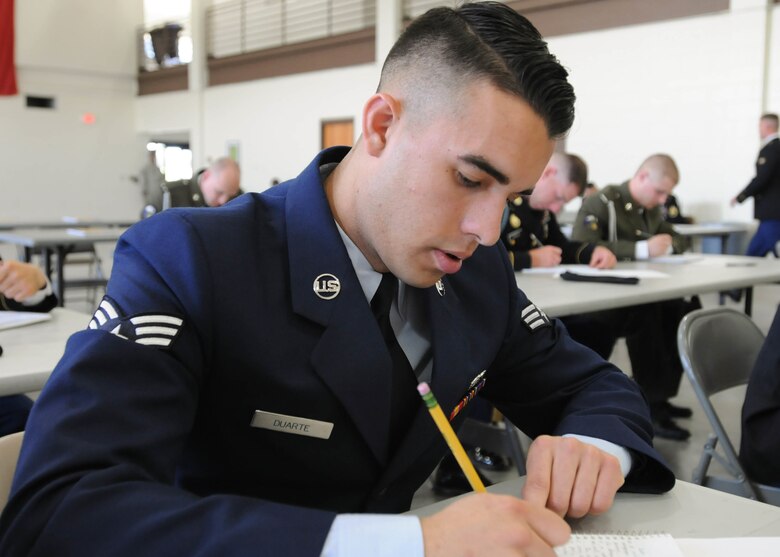 U.S. Air Force Senior Airman Orlando Duarte, an aerospace propulsion mechanic with the 149th Fighter Wing, Texas Air National Guard, headquartered at Joint Base San Antonio-Lackland, Texas, writes an essay for the Texas Military Department’s Best Warrior Competition, March 2, 2017 at Camp Swift, Bastrop, Texas. Duarte was graded on his essay question as well as an appearance board on the first day of the competition. (U.S. Army National Guard photo by Sgt. Marline Duncan)