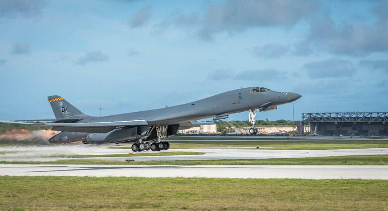 A U.S. Air Force B-1B Lancer assigned to the 9th Expeditionary Bomb Squadron, deployed from Dyess Air Force Base (AFB), Texas, takes off March 10, 2017, at Andersen AFB, Guam. The B-1B's are deployed to Andersen as part of U.S. Pacific Command's (USPACOM) Continuous Bomber Presence operations. This forward deployed presence demonstrates continuing U.S. commitment to stability and security in the Indo-Asia-Pacific region. Most importantly, these bomber rotations provide Pacific Air Forces and USPACOM commanders an extended deterrence capability. (U.S. Air Force photo by Senior Airman Joshua Smoot)