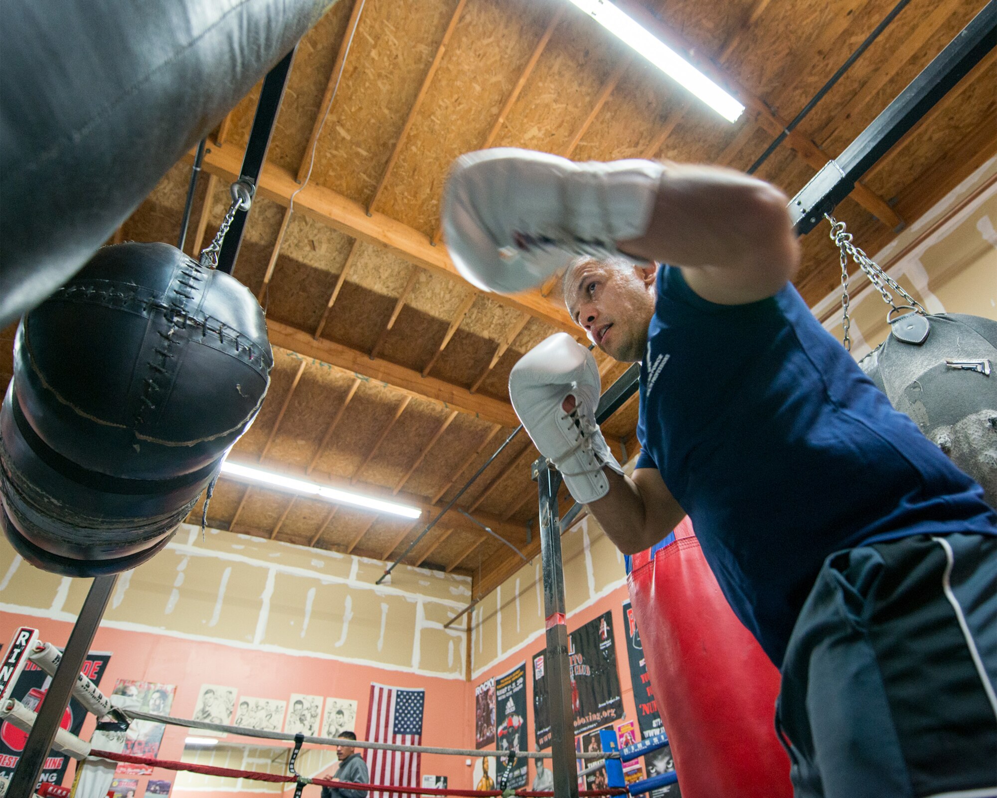 U.S. Air Force Capt. Eduardo Torrez, 60th Medical Operations Squadron, Travis Air Force Base, Calif., performs boxing drills at the JL Tepito Boxing Club in Fairfield, Calif., Feb. 27, 2017. Torrez is a nurse at David Grant USAF Medical Center and was an amateur boxer before joining the Air Force. (U.S. Air Force photo/Louis Briscese)