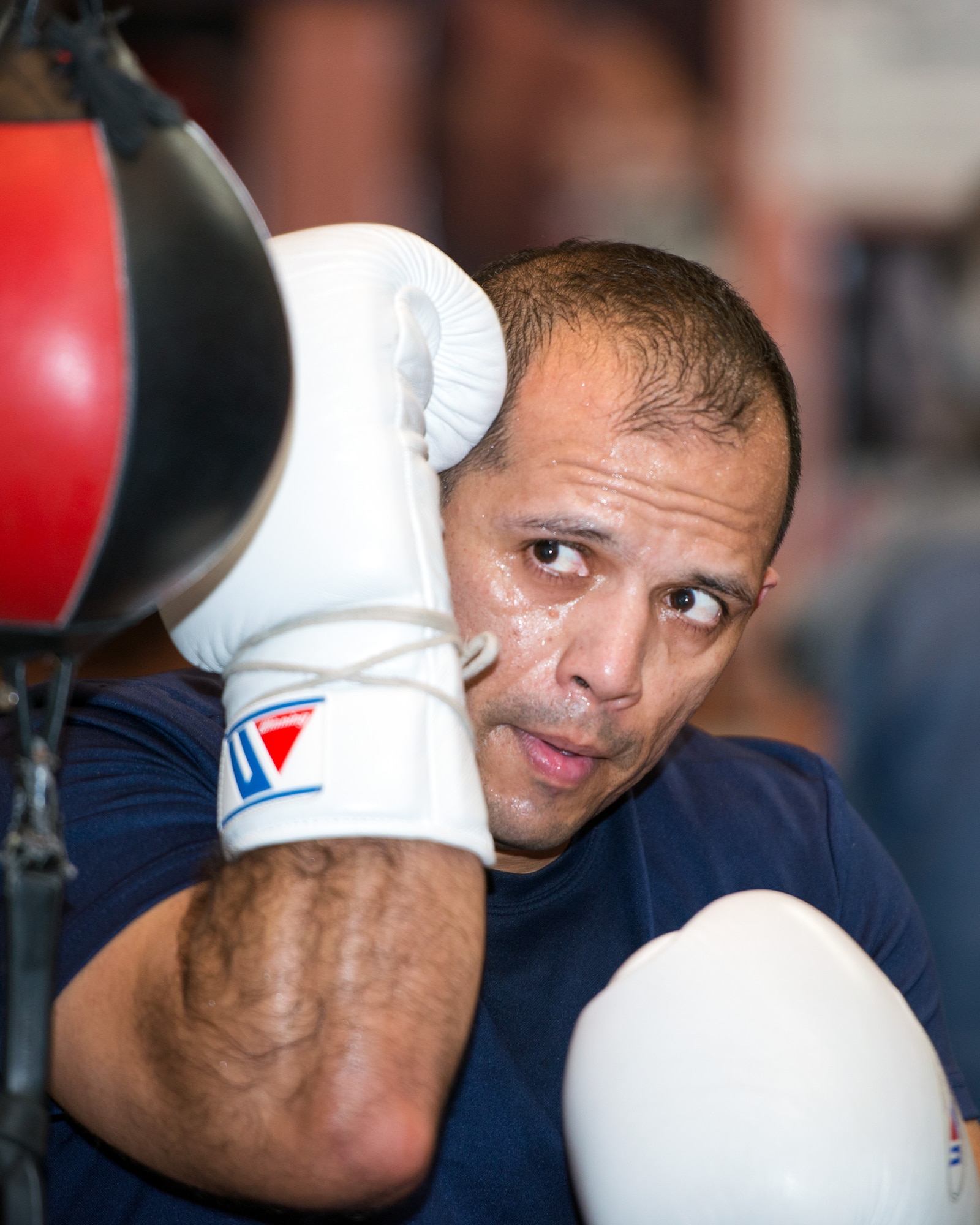 U.S. Air Force Capt. Eduardo Torrez, 60th Medical Operations Squadron, Travis Air Force Base, Calif., performs boxing drills at the JL Tepito Boxing Club in Fairfield, Calif., Feb. 27, 2017. Torrez is a nurse at David Grant USAF Medical Center and was an amateur boxer before joining the Air Force. (U.S. Air Force photo/Louis Briscese)