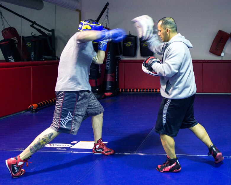 U.S. Air Force Capt. Eduardo Torrez, 60th Medical Operations Squadron, conducts a training session at the fitness center, Travis Air Force Base, Calif., Mar. 5, 2017. Torrez is a nurse at David Grant USAF Medical Center and was an amateur boxer before joining the Air Force. (U.S. Air Force photo/Louis Briscese)