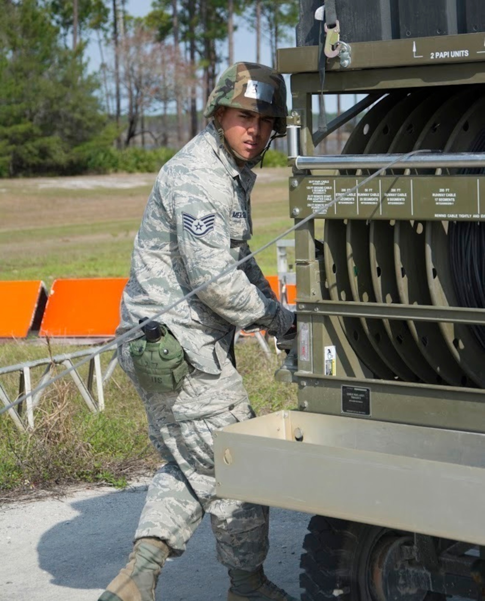 U.S Air Force Staff Sgt. Jason J. Merseburgh, a 624th Civil Engineer Squadron electrician, practices installing the Emergency Airfield Lighting System on March 2, 2017 at the Silver Flag site, Tyndall Air Force Base, Fla. EALS is a runway lighting system designed to be quickly installed at contingency airfields. Ten Reservists from the 624th CES deployed to Silver Flag in February to participate in the contingency training exercise, which focused on hands-on technical training, showcasing what an Airman could expect if deployed to a location without infrastructure. (U.S. Air Force photo by Master Sgt. Raquel Griffin)