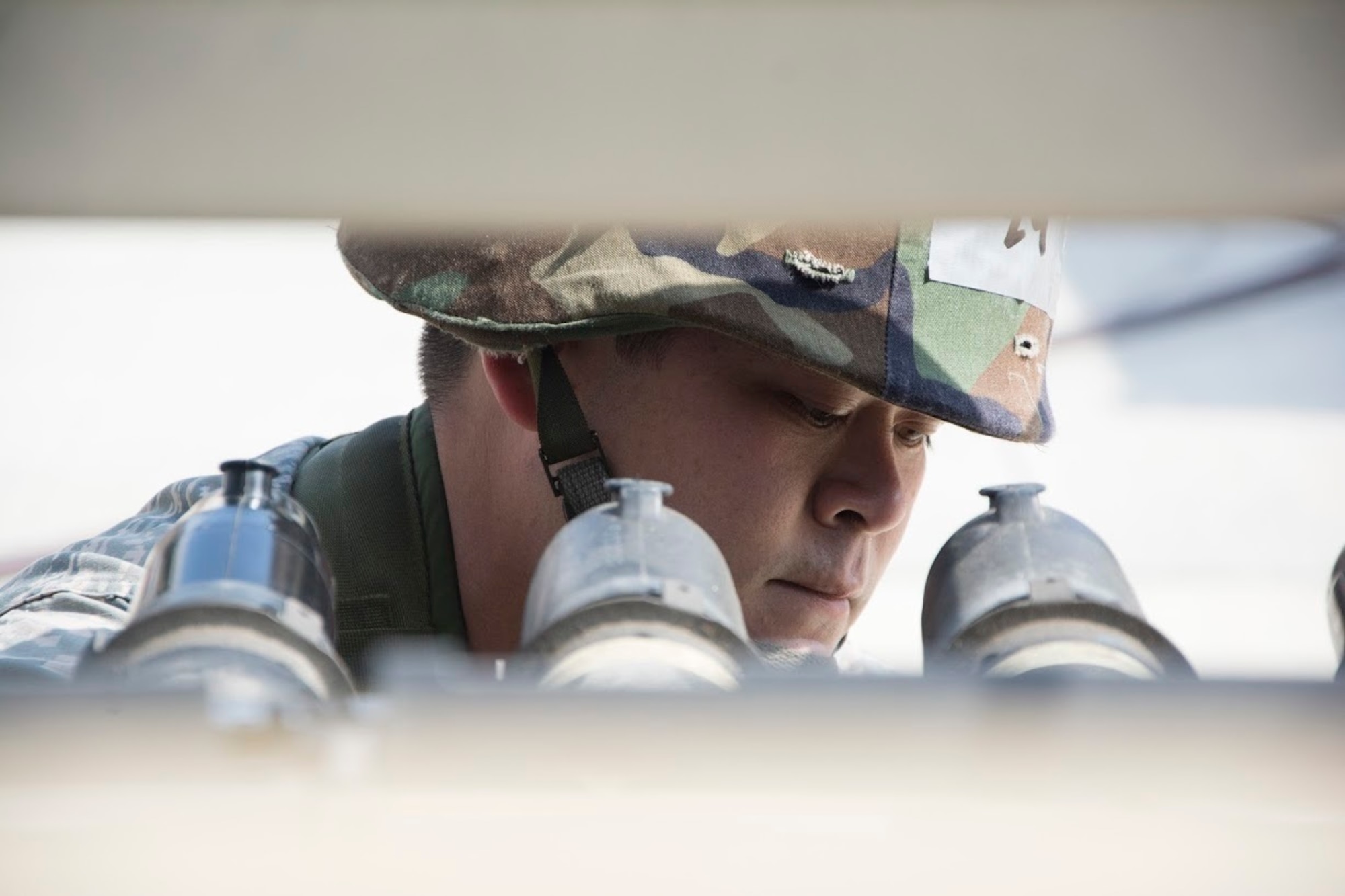 U.S Air Force Staff Sgt. Lloyd M. Loftis, a 624th Civil Engineer Squadron electrician, works on load break elbow connectors during Silver Flag at Tyndall Air Force Base, Fla., March 2, 2017. A load break elbow connector is a fully insulated and shielded plug-in for connecting underground cable to transformers. Located on Oahu and a component of the Air Force Reserve, the 624th CES is comprised of three PRIME BEEF teams, seven Firefighting teams and one Readiness team, which support the 624th Regional Support Group's mission to deliver mission essential capability through combat readiness, quality management and peacetime deployments. (U.S. Air Force photo by Master Sgt. Raquel Griffin)