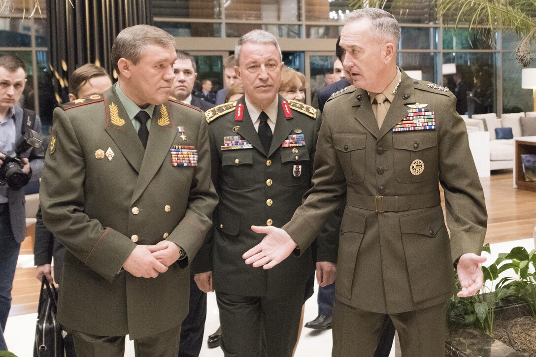 Marine Corps Gen. Joe Dunford, right, chairman of the Joint Chiefs of Staff, speaks with Gen. Hulusi Akar of the Turkish army, center, and Gen. Valery Gerasimov of the Russian army in Antalya, Turkey, March 6, 2017. The three chiefs of defense discussed their nations’ operations in northern Syria. DoD photo by Navy Petty Officer 2nd Class Dominique A. Pineiro