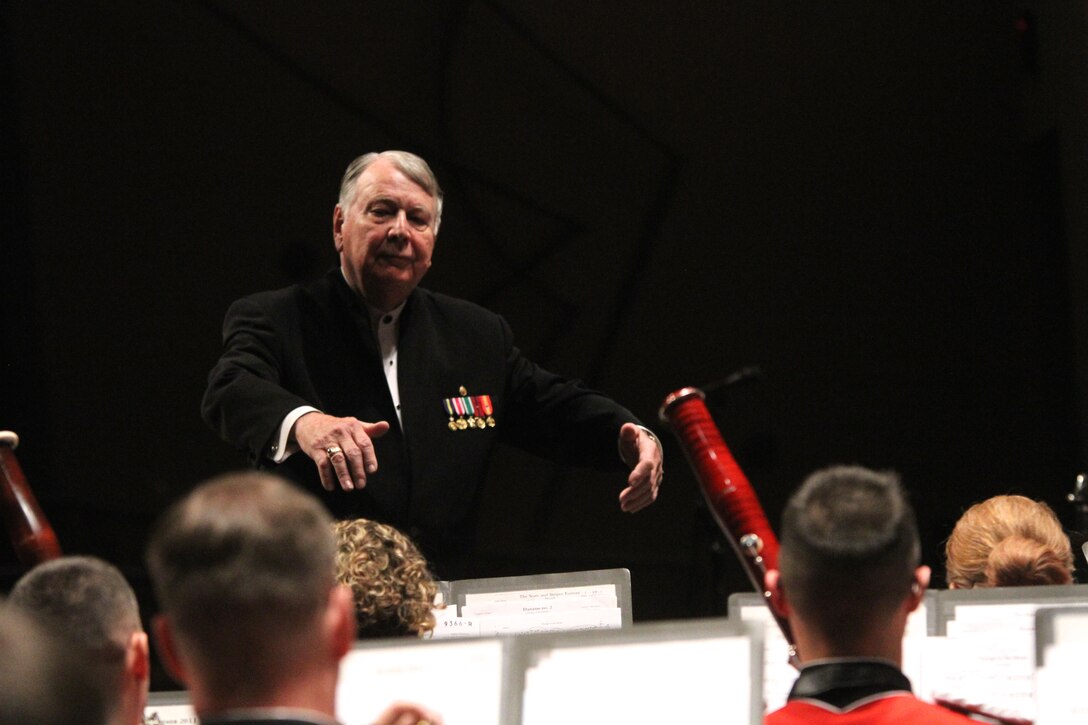 On March 10, 2017, the Marine Band performed at the Singletary Center in Lexington, Ky., as part of the 83rd convention of the American Bandmasters Association. Pictured Col. John R. Bourgeois, USMC (ret.), Director Emeritus, U.S. Marine Band,
ABA Past President and Honorary Life President,
conducting Jacques Offenbach’s Overture to Voyage to the Moon. (U.S. Marine Corps photo by Master Sgt. Amanda Simmons/released)