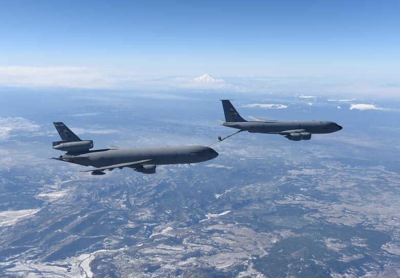 A KC-135 Stratotanker from Beale Air Force Base refuels a KC-10 Extender from Travis Air Force Base during a routing training sortie on December 21, 2016. (U.S. Air Force photo by Staff Sgt. Bobby Cummings)