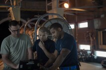 U.S. Air Force Airmen assigned to the 18th Component Maintenance Squadron research inspection limits March 10, 2017, at Kadena Air Base, Japan. Ensuring every part of the engine is ready and safe is of the highest priority when it comes to keeping the mission moving. (U.S. Air Force photo by Airman 1st Class Quay Drawdy)