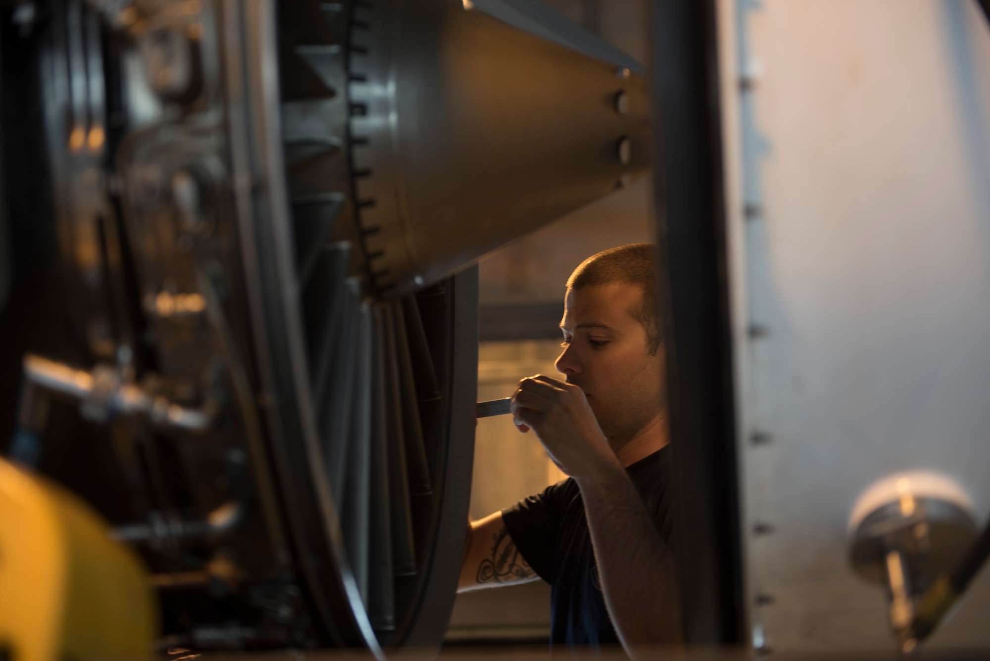 U.S. Air Force Staff Sgt. Stephen Baudo, 18th Component Maintenance Squadron aerospace propulsion craftsman, checks spacing on an engine blade March 10, 2017, at Kadena Air Base, Japan. When installing new cores into an existing unit, the entire engine goes through a rigorous series of checks and tests before being declared mission ready. (U.S. Air Force photo by Airman 1st Class Quay Drawdy)