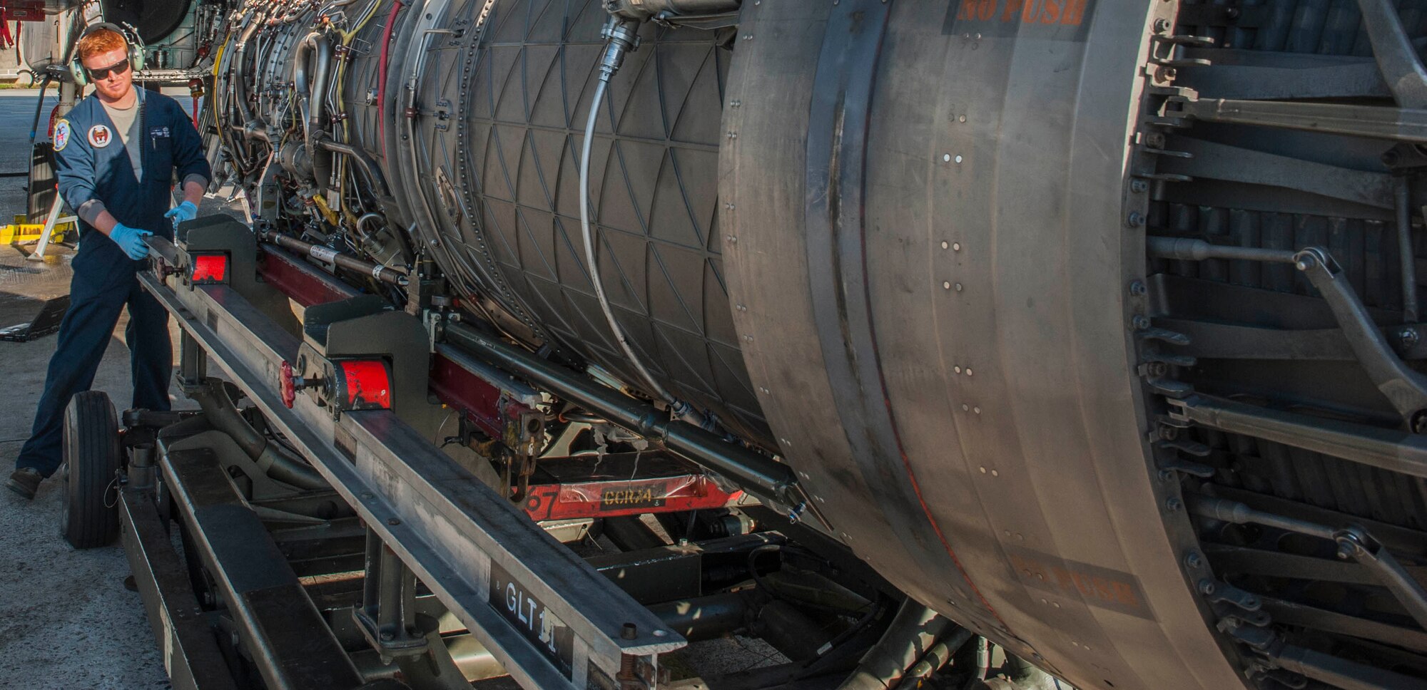 U.S. Air Force Staff Sgt. Donald Wallace, a 44th Aircraft Maintenance Unit maintainer, inspects the engine of an F-15 Eagle during routine maintenance, Feb. 14, 2017, on Kadena Air Base, Japan. The mission of the 44th AMU is to ensure serviceable aircraft are able to meet mission requirements, keeping pilots current in training and combat ready. (U.S. Air Force photo by Senior Airman Nick Emerick/Released)