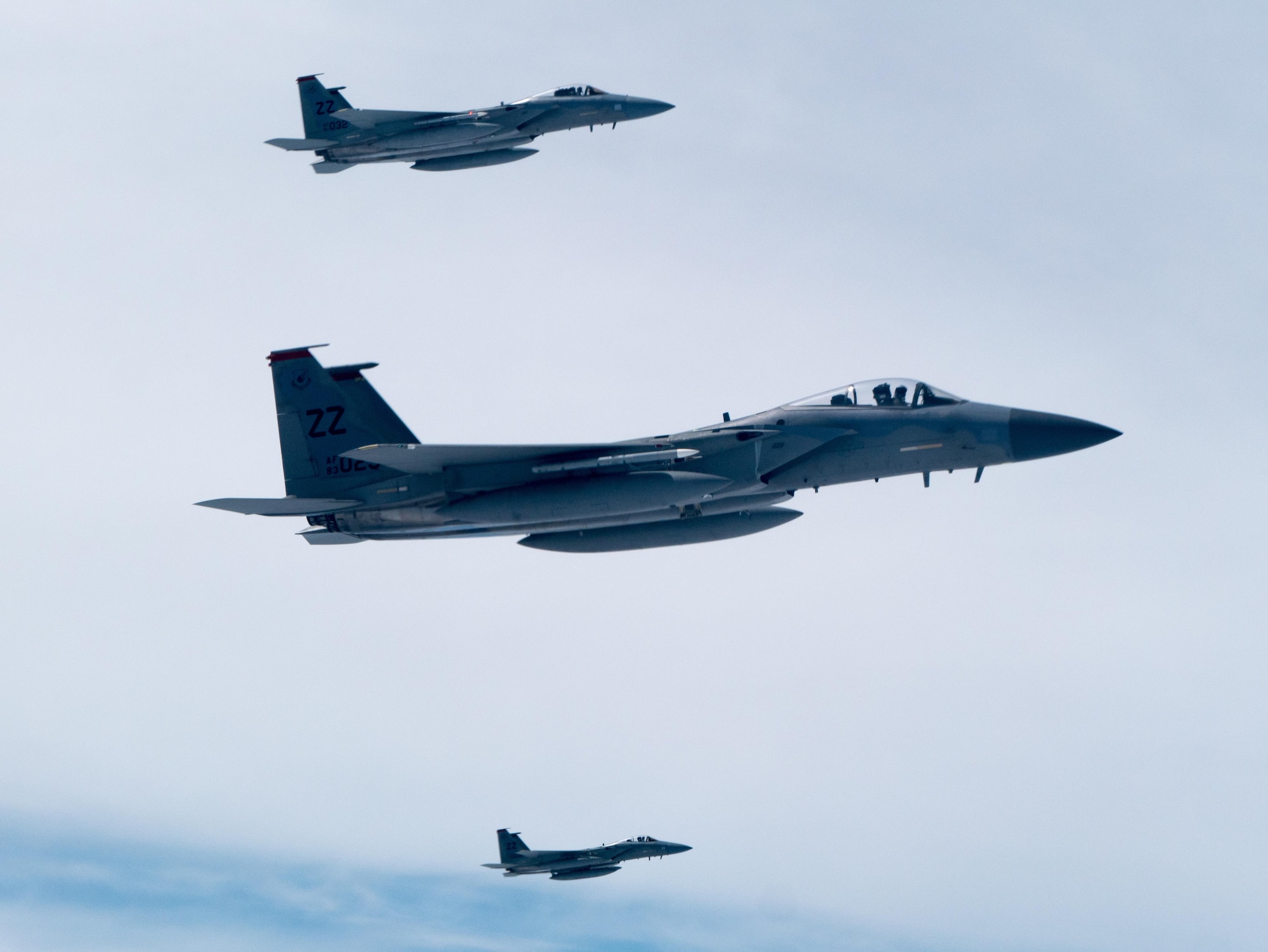 U.S. Air Force F-15C Eagles from the 67th Fighter Squadron fly next to a KC-135 Stratotanker from the 909th Air Refueling Squadron March 6, 2017, en route to Kadena Air Base, Japan. Both Squadrons returned to Kadena AB after spending three weeks training with Australian and Japanese partners for exercise Cope North at Andersen Air Force Base, Guam. Cope North is an annual exercise which serves as a keystone event to promote stability and security throughout the Indo-Asia Pacific region by enabling regional forces to hone vital readiness skills. (U.S. Air Force photo by Senior Airman John Linzmeier)