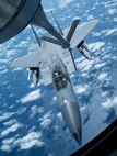 A U.S. Air Force F-15 Eagle from the 67th Fighter Squadron receives an inflight refuel from a KC-135 Stratotanker from the 909th Air Refueling Squadron March 6, 2017, in route to Kadena Air Base, Japan. Both Squadrons returned to Kadena after spending three weeks training with Australian and Japanese partners for exercise Cope North at Andersen Air Force Base, Guam. The 909th ARS's motto is 'Always There,' symbolizing the squadron's constant presence and devotion to support allies and partners throughout the Indo-Asia Pacific. (U.S. Air Force photo by Senior Airman John Linzmeier)