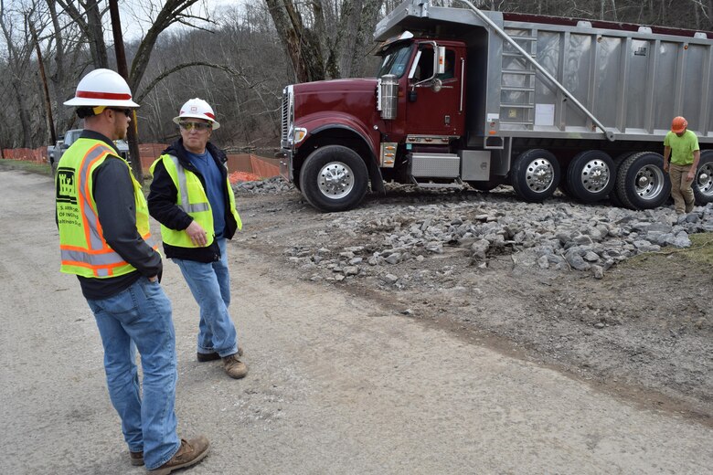 Matt McKissick, project engineer, and Bob Tramontina, construction control representative, oversee the more than $880,000 shoreline reclamation project in Worthington, West Virginia. The project is designed to protect a sanitary sewer line that runs along the West Fork River bank. 