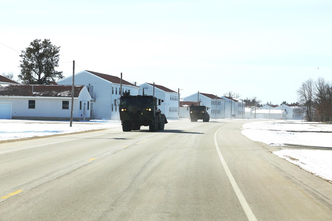 Soldiers at Fort McCoy, Wis., to support an Army Reserve exercise, Operation Cold Steel, drive M1075A1 Palletized Load System trucks in a convoy during exercise preparation March 3, 2017, at the installation. Operation Cold Steel’s purpose is to qualify select gun crews to support “Objective-T” requirements for Army Early Response Forces, or AERF. Army Reserve forces, which are part of the overall AERF contingency forces, are part of the Army plan to provide a force that can deploy on short notice to respond to contingencies when needed. 
