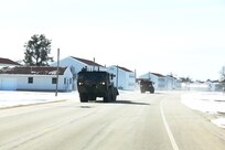 Soldiers at Fort McCoy, Wis., to support an Army Reserve exercise, Operation Cold Steel, drive M1075A1 Palletized Load System trucks in a convoy during exercise preparation March 3, 2017, at the installation. Operation Cold Steel’s purpose is to qualify select gun crews to support “Objective-T” requirements for Army Early Response Forces, or AERF. Army Reserve forces, which are part of the overall AERF contingency forces, are part of the Army plan to provide a force that can deploy on short notice to respond to contingencies when needed. (U.S. Army Photo by Scott T. Sturkol, Public Affairs Office, Fort McCoy, Wis.)