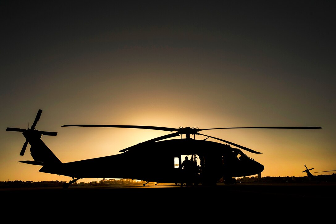 An Army UH-60 Black Hawk helicopter sits on the flightline during Emerald Warrior 17 at Hurlburt Field, Fla., March 6, 2017. Emerald Warrior is a U.S. Special Operations Command exercise during which joint special operations forces train to respond to various threats. Air Force photo by Staff Sgt. Corey Hook