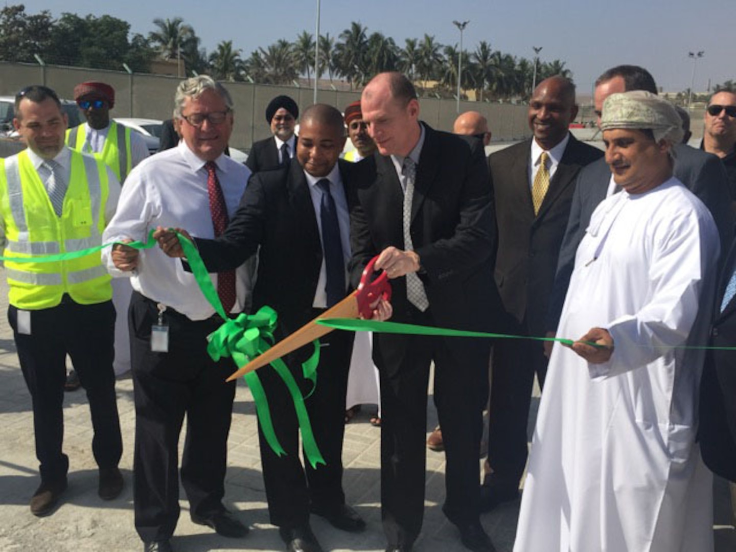 DLA Energy Commander Air Force Brig. Gen. Martin Chapin cuts the ribbon to officially open DLA Distribution's new material processing center in Salalah, Oman Feb. 9. 