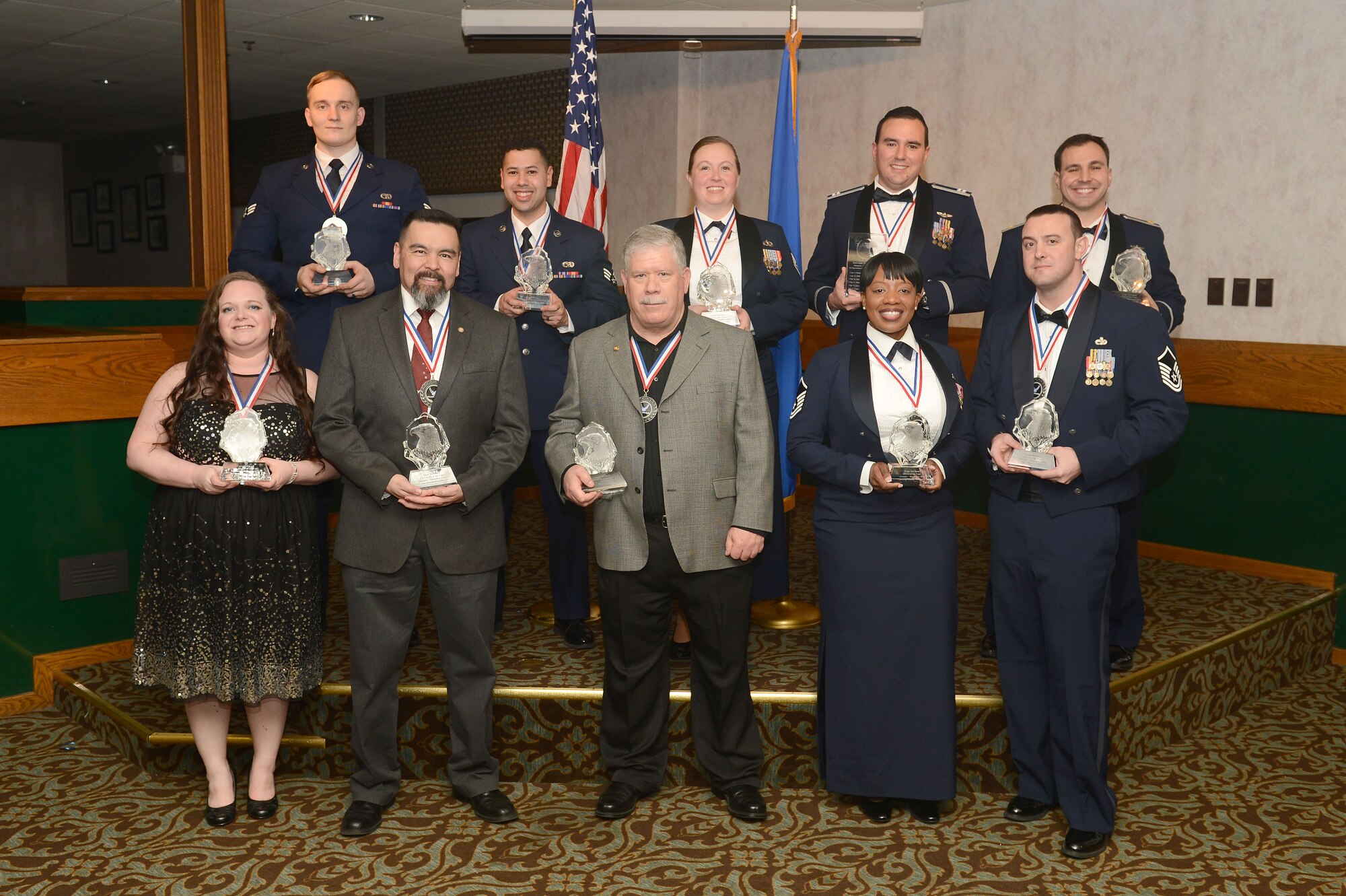 Award winners of the 2016 Team McChord Annual Awards Banquet pose for a photo after the ceremony March 10, 2017 at Joint Base Lewis-McChord, Wash. The theme for this year’s banquet was winning the war in air, space and cyber using the knowledge of our millennials and the guest speaker was Col. Jeremy Horn, 194th Wing Washington Air National Guard commander. (U.S. Air Force photo/Senior Airman Divine Cox)
