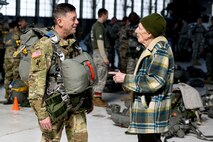 U.S. Army Reserve Maj. Gen. Daniel Ammerman, U.S. Army Civil Affairs and Psychological Operations Command (Airborne) commander, talks with WWII paratrooper James H. “Pee Wee” Martin prior to conducting a paratroop jump at Wright-Patterson Air Force Base, Ohio, March 11, 2017. Martin is one of the last remaining “Toccoa Originals” of 1942, who is still traveling, meeting the public and carrying forward an eyewitness account of his unit’s experiences. (U.S. Air Force photo by Wesley Farnsworth / Released)