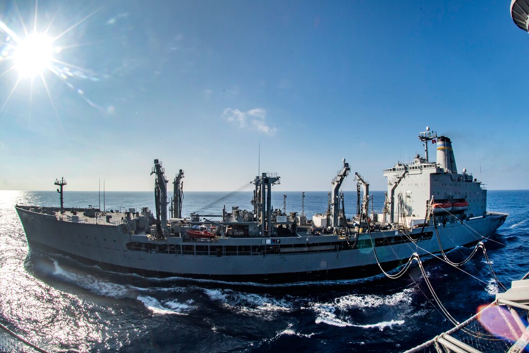 The aircraft carrier USS Carl Vinson conducts a replenishment at sea with the fleet replenishment oiler USNS Tippecanoe in the South China Sea, March 5, 2017. Navy photo by Petty Officer 2nd Class Sean M. Castellan


