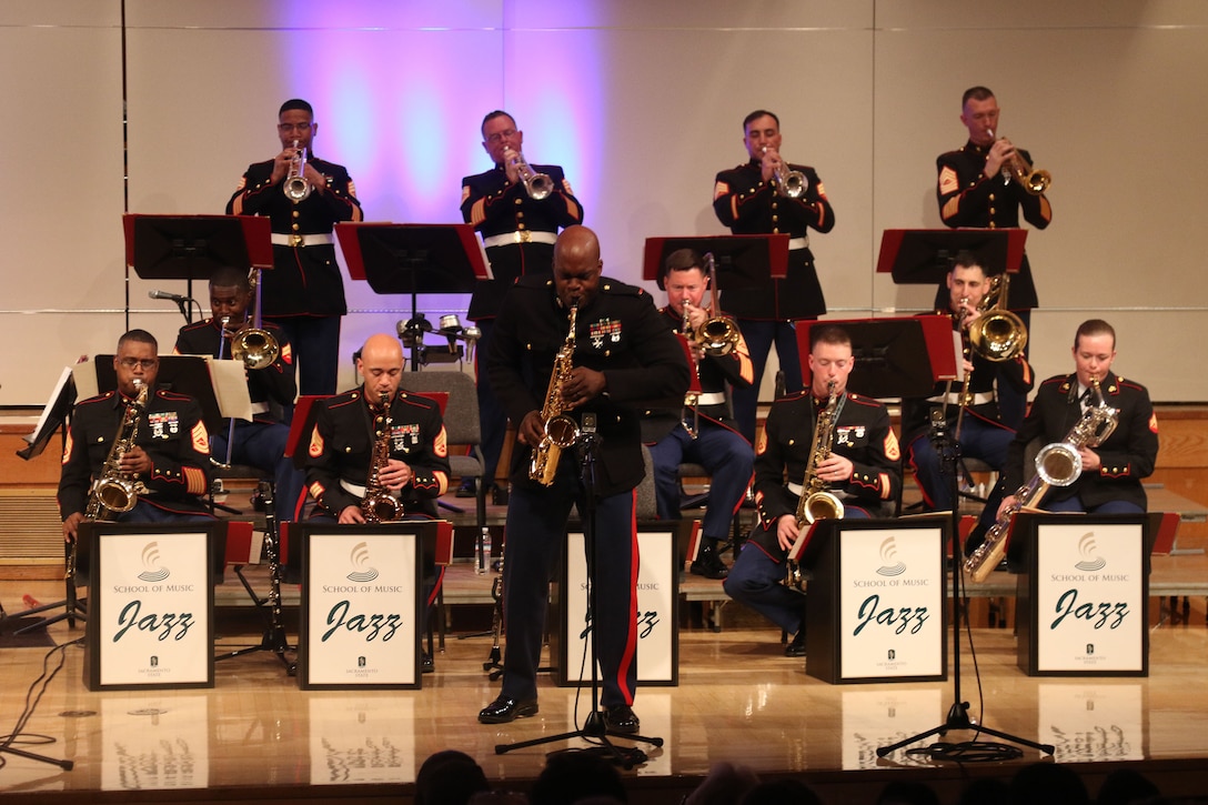 Chief Warrant Officer 2 Demarius Jackson, band director, 2nd Marine Aircraft Wing, performs a solo during a concert with the Marine Corps Jazz Orchestra at California State University Sacramento, March 10, 2017. The orchestra features top Marine musicians from throughout the Corps. They tour annually to share their music, culture, and patriotism with public audiences. This year’s concert was their first performance in Sacramento. (U.S. Marine Corps photo by Staff Sgt. Jacob Harrer)
