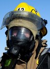 Dustin Bazille, Kenmore fire department firefighter, at Minot Air Force Base, N.D., Feb. 24, 2017. The Minot AFB fire department hosted training with local fire departments, scenarios included simulated helicopter fire and missile field response. (U.S. Air Force photo/Staff Sgt. Chad Trujillo)